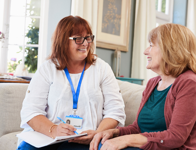 ideal complex care employee conducting an assessment explaining our complex care services